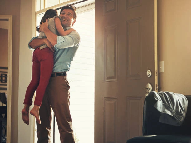 A father hugging his child to repair a connection and build secure attachment