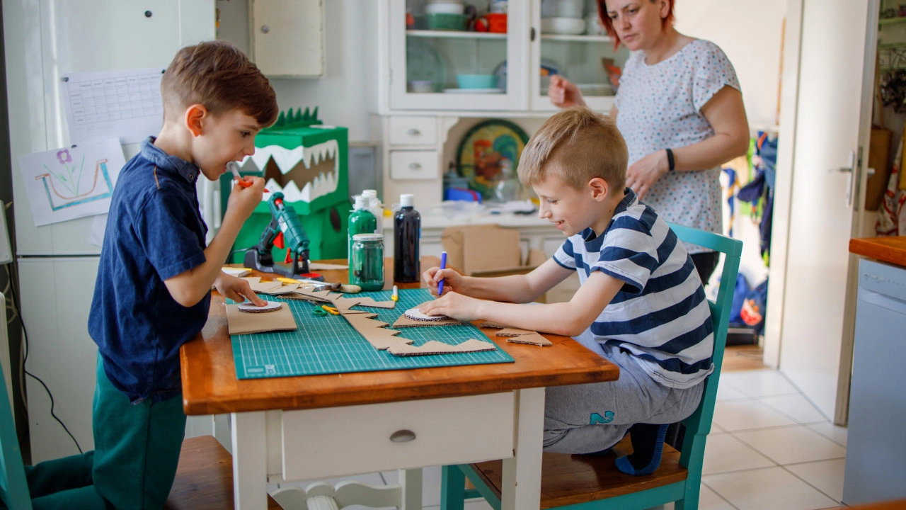 A parent and child doing a craft activity together at a kitchen table as part of an analog childhood approach